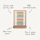 Wooden abacus with colorful beads on a white background, labeled for educational benefits.
