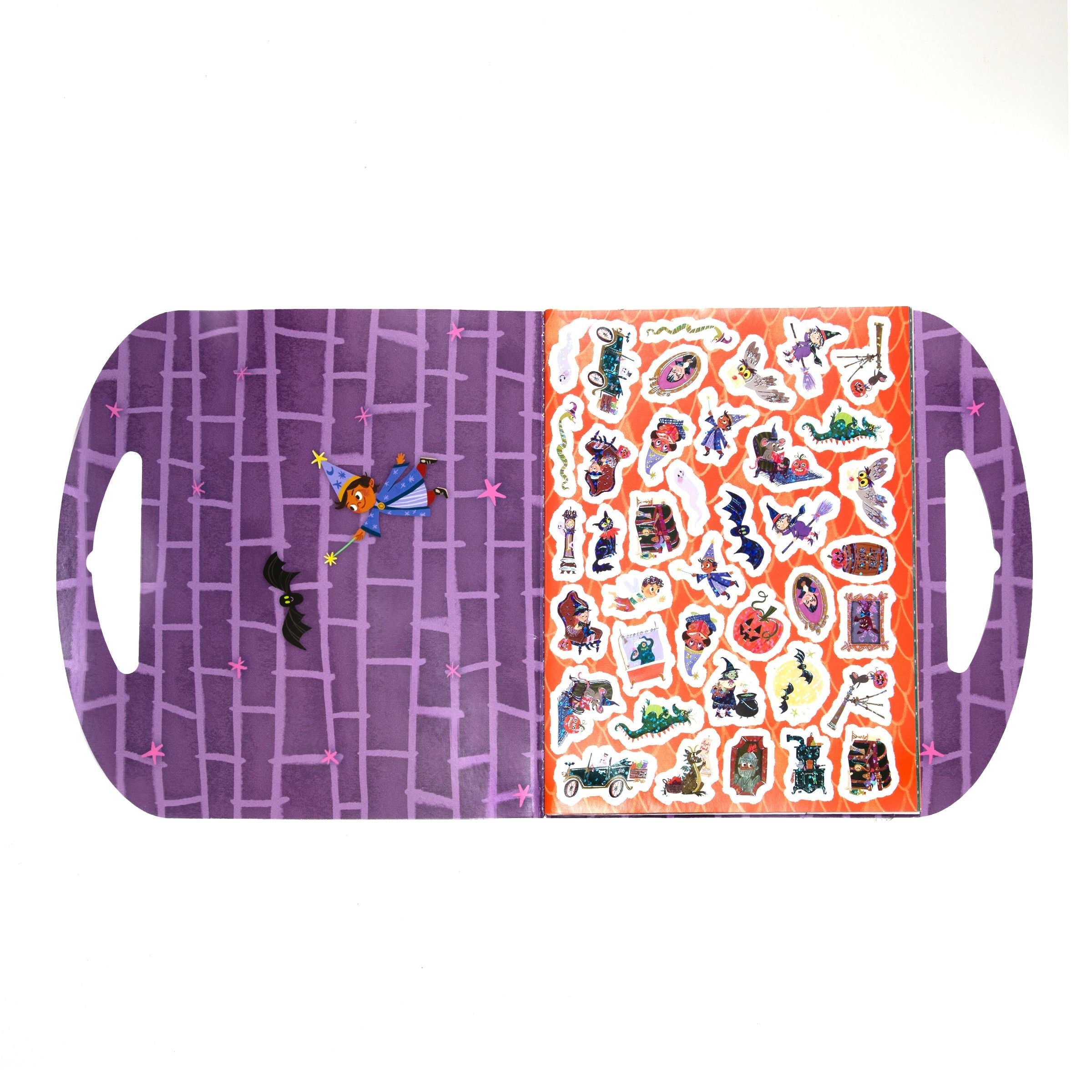 A rectangular Halloween-themed tray or board with rounded corners and side handles, shown on a white background. The left half is purple with a brick-pattern design, a small witch figure, and a black bat.
