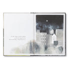 Open book with a black and white illustration of a cityscape on a white background