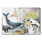 Illustrated book open to pages with animal cutouts and text
