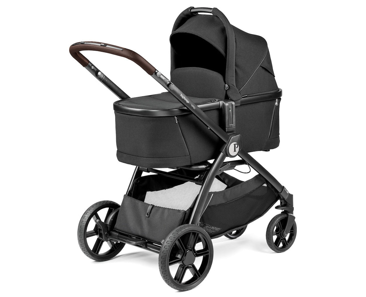 Black baby stroller on a white background