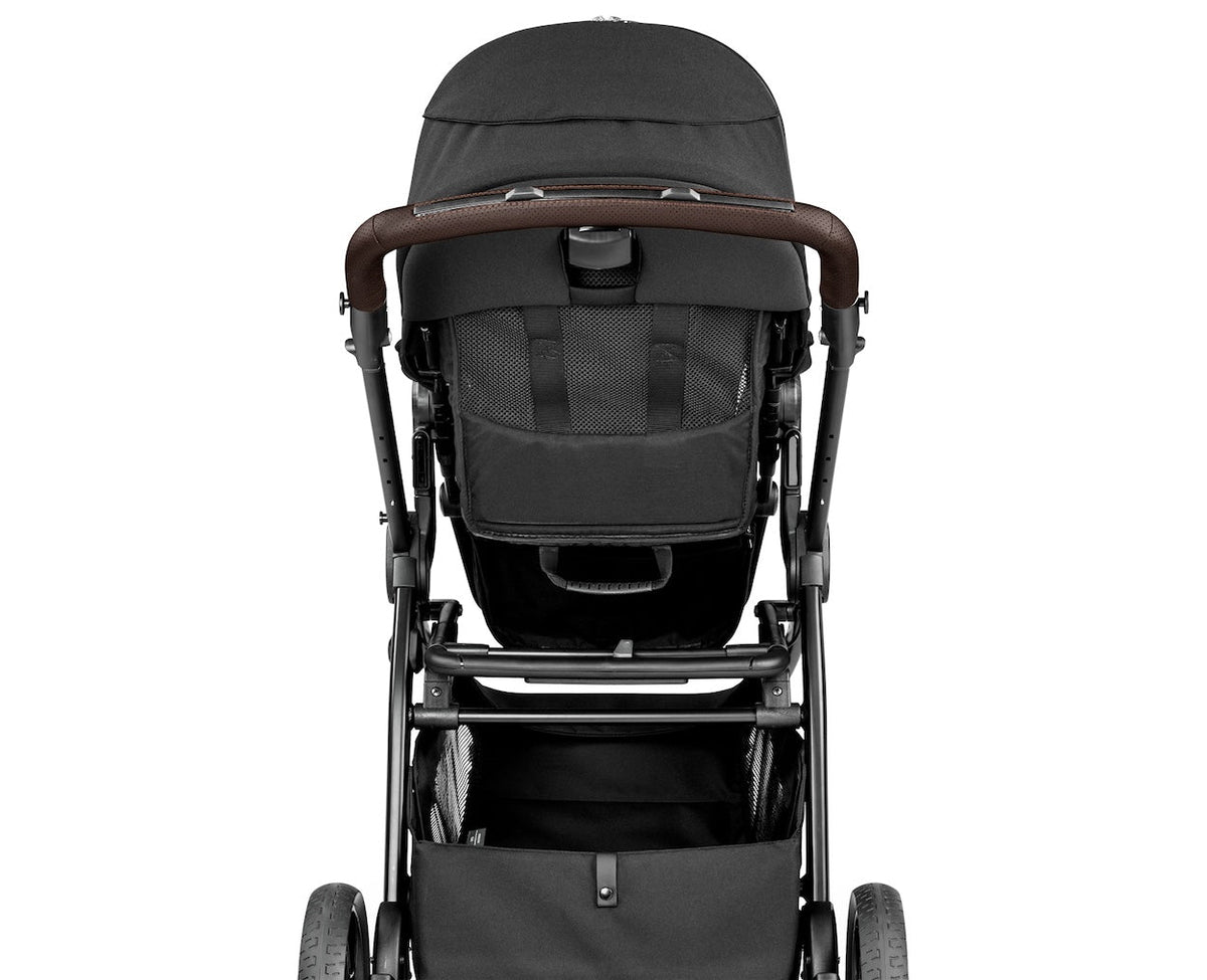 Black stroller with brown accents on a white background