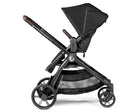 Black stroller with a folded seat on a white background