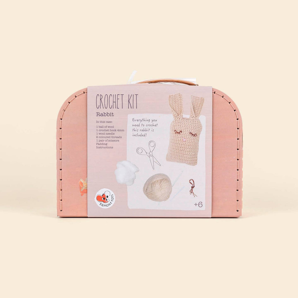Crochet kit packaging with a rabbit design on a beige background