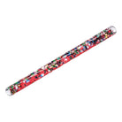 Decorative red slap bracelet with colorful patterns on a white background