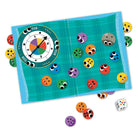 Colorful game board with dice and game pieces on a white background