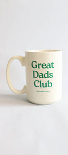 Mug with 'Great Dads Club' text on a light background