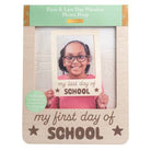 Wooden photo prop frame with 'First & Last Day of School' text and a photo of a child holding a sign.