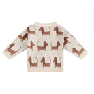 Children's sweater with dachshund pattern on a white background