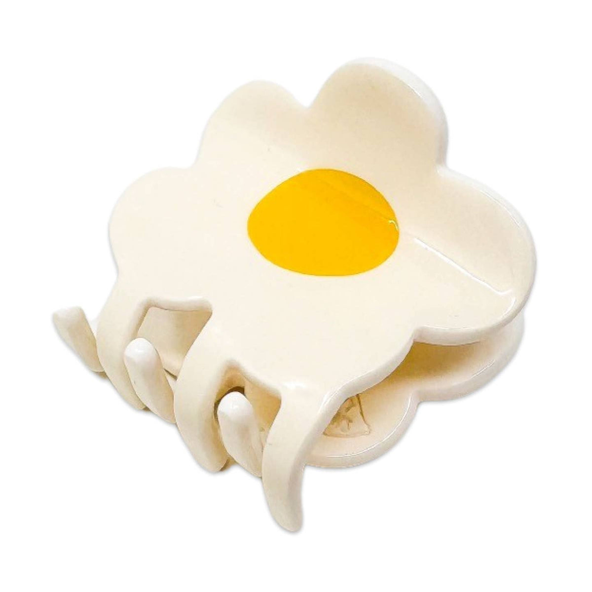 Flower-shaped egg slicer with a yellow center on a white background