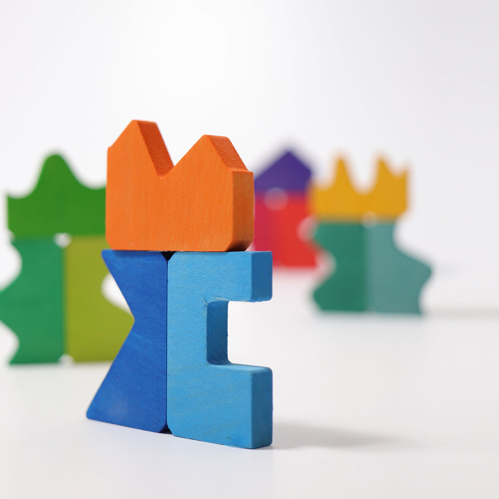 Colorful wooden blocks spelling 'YES' on a white background