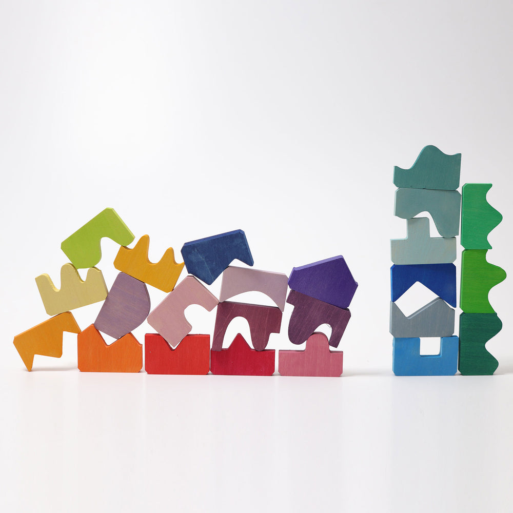 Colorful wooden building blocks on a white background