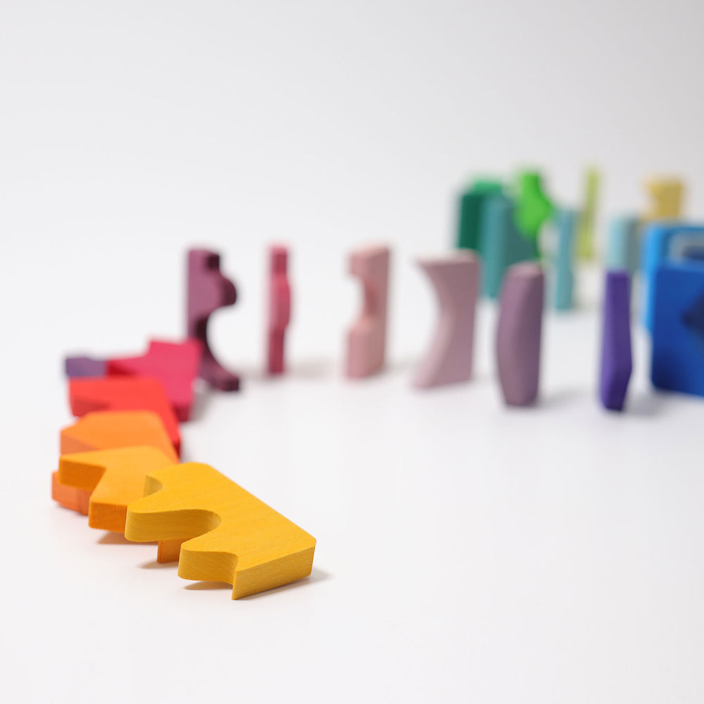 Colorful 3D puzzle pieces on a white background