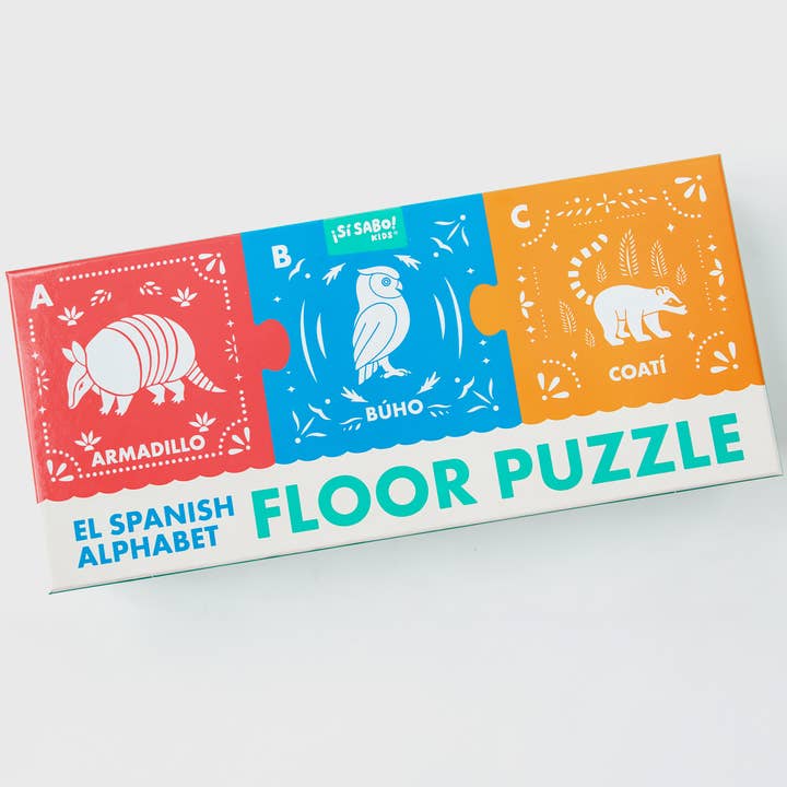Children's floor puzzle with Spanish alphabet letters on a white background