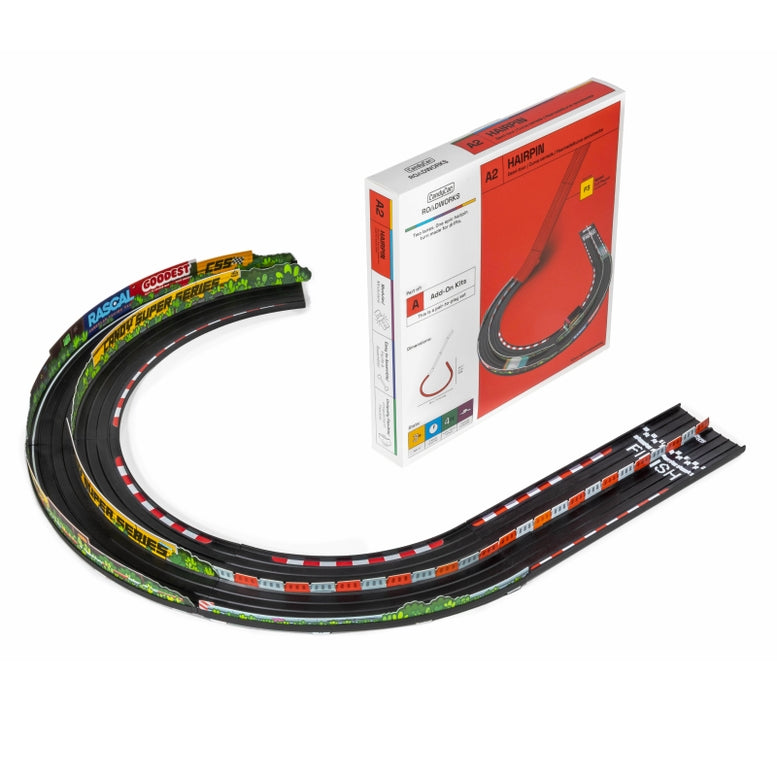 Model train track set with a box on a white background