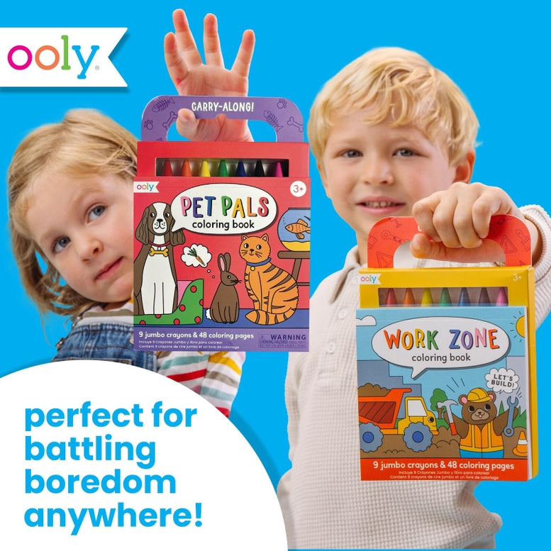 Two children holding colorful Ooly coloring books against a bright blue background. One child holds a red 'Pet Pals Coloring Book' and the other holds a yellow 'Work Zone Coloring Book'.