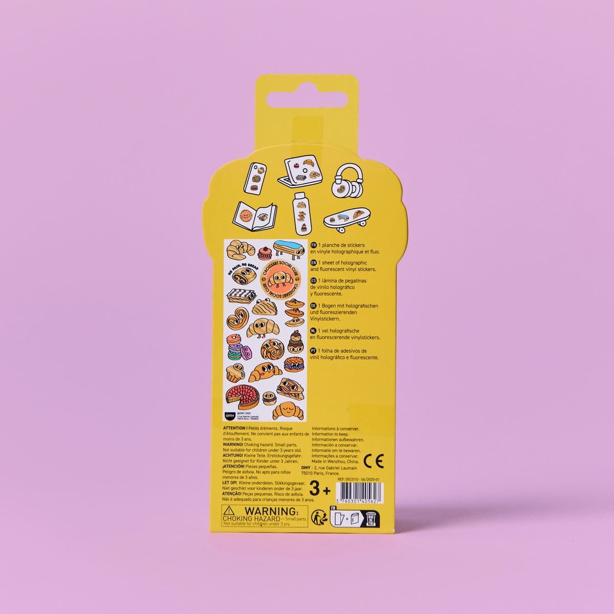 Yellow packaging with stickers on a pink background