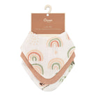 A white muslin baby bib featuring a repeating pattern of pastel rainbow arches in peach, green, and orange, shown on a solid white background.