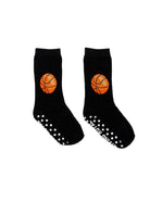 Black socks with orange basketball graphics and white sole patterns on a white background