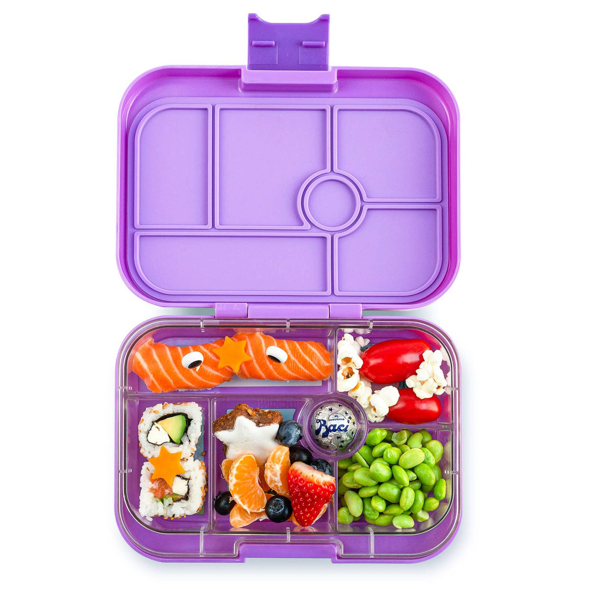 Purple bento box with compartments filled with various food items on a white background
