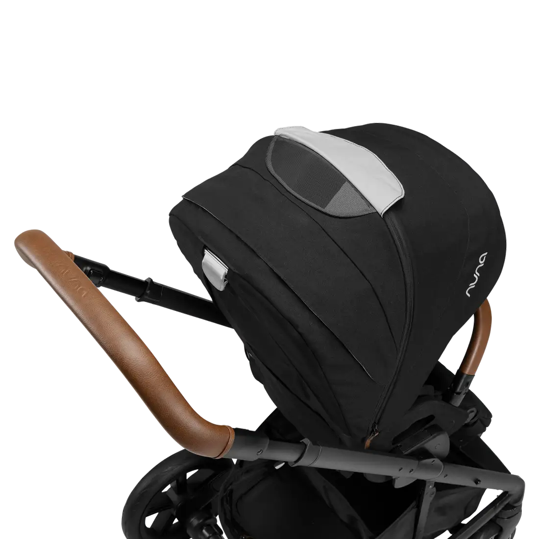 A close-up profile view of the black MIXX Next + Pipa Aire RX Travel System by Nuna stroller showing the brown leatherette handlebar and canopy with a mesh ventilation window, set against a checkered transparent background.