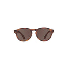 Sunglasses with tortoiseshell frame and dark lenses on a white background
