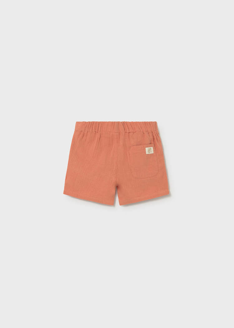 Orange shorts on a white background
