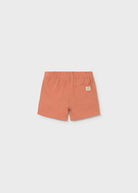 Orange shorts on a white background