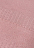 Close-up of a pink textured fabric