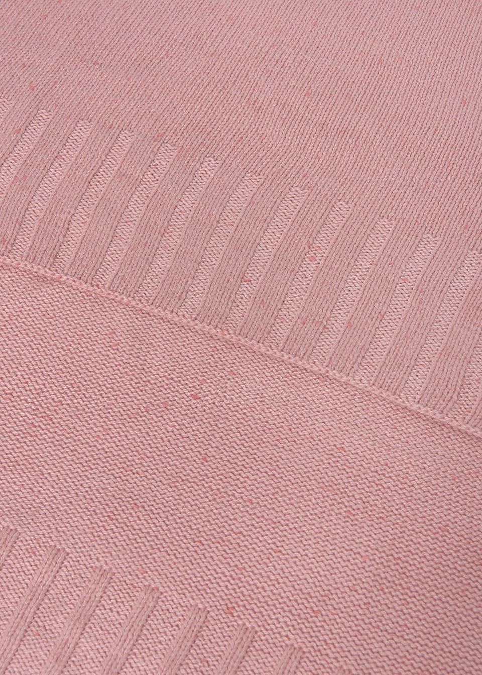 Close-up of a pink textured fabric