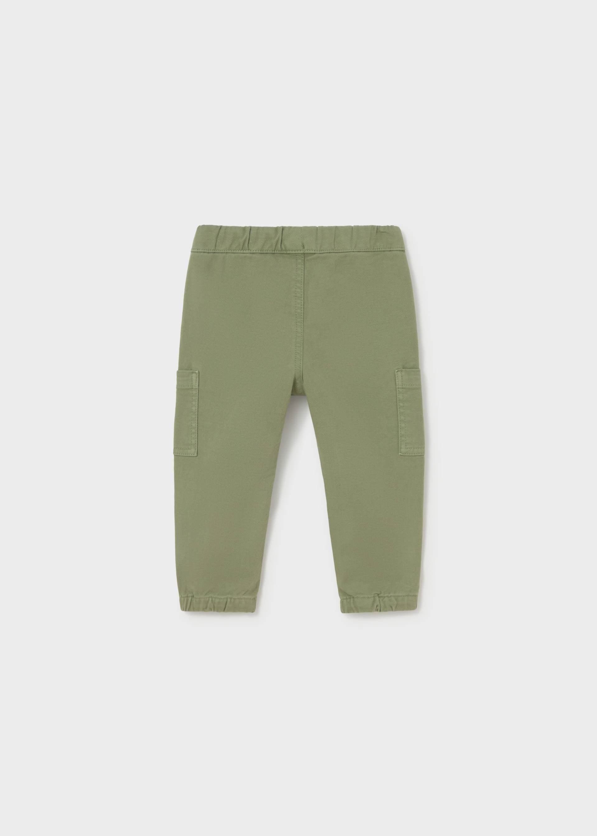 A pair of toddler's olive green cargo pants with an elastic waistband and side pockets, shown flat on a light gray background.
