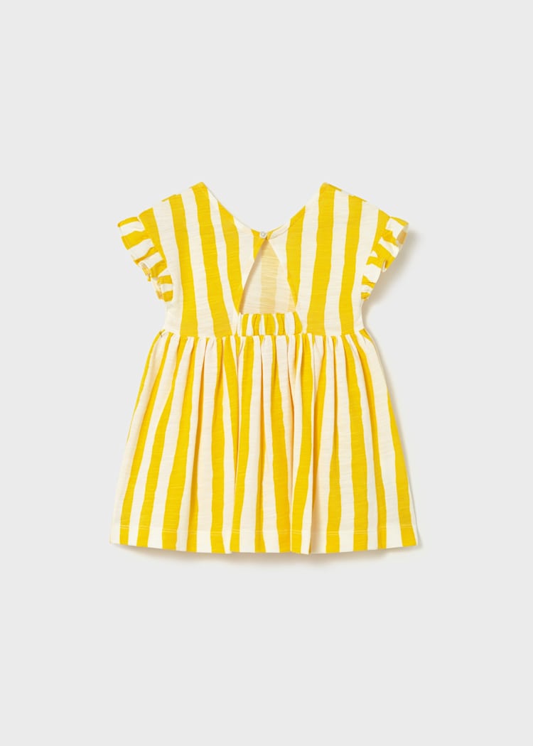 Yellow and white striped dress with ruffled sleeves on a light gray background