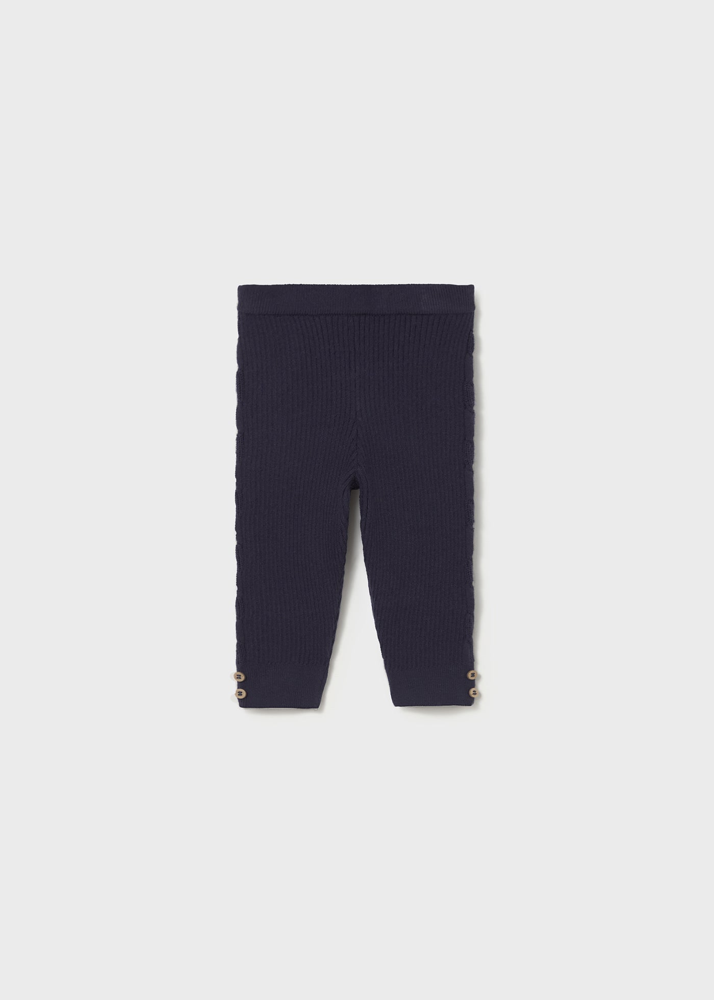 Navy blue leggings on a light gray background