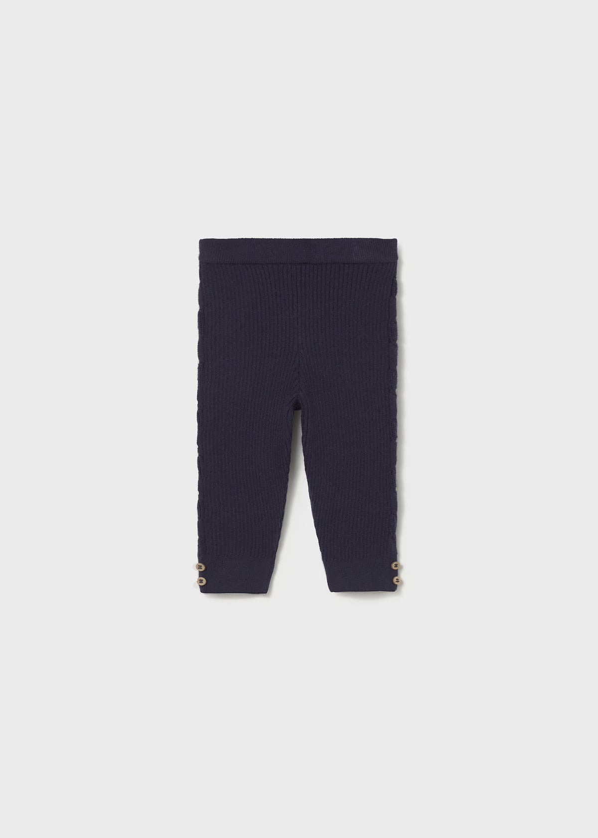 Navy blue leggings on a light gray background
