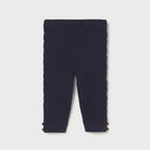 Navy blue ribbed baby leggings on a white background