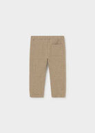 A pair of children's heathered tan pants with an elastic waistband and a side pocket, shown flat against a light gray background.