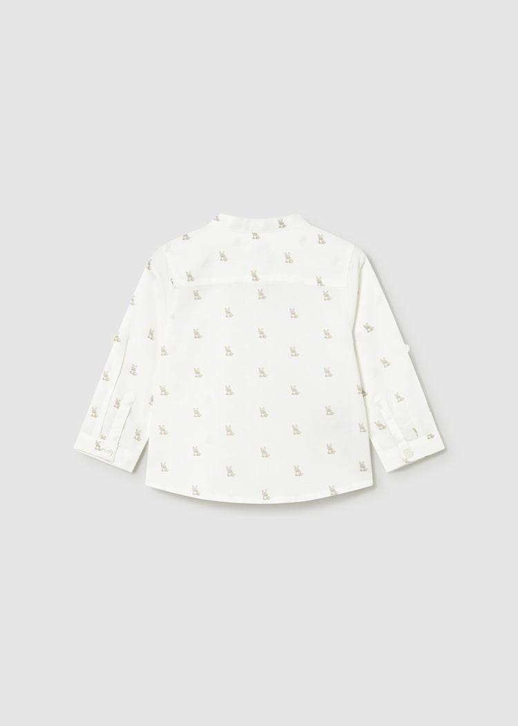 White long-sleeve shirt with subtle pattern on a light gray background
