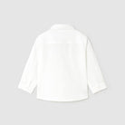 White blouse on a light gray background