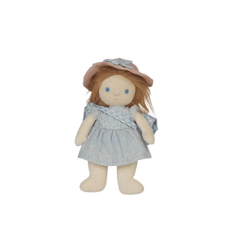 Stuffed doll with a pink hat and blue dress on a transparent background