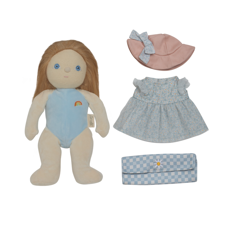 Plush doll with blue outfit, pink hat, and matching bag on a white background