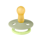 Yellow and green pacifier on a white background