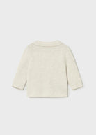 Light-colored sweater on a white background