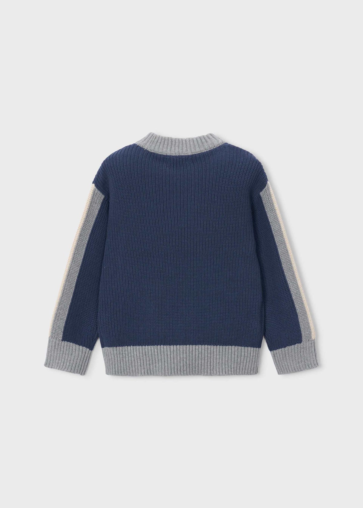 A navy blue ribbed knit sweater with light gray ribbed trim on the collar, cuffs, and hem, featuring light gray and off-white sleeve panels, shown from the back on a light gray background.