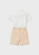 Striped shirt and beige shorts on a light gray background