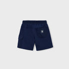 Navy blue shorts on a light gray background