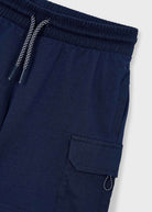 Navy blue cargo shorts with a drawstring on a white background
