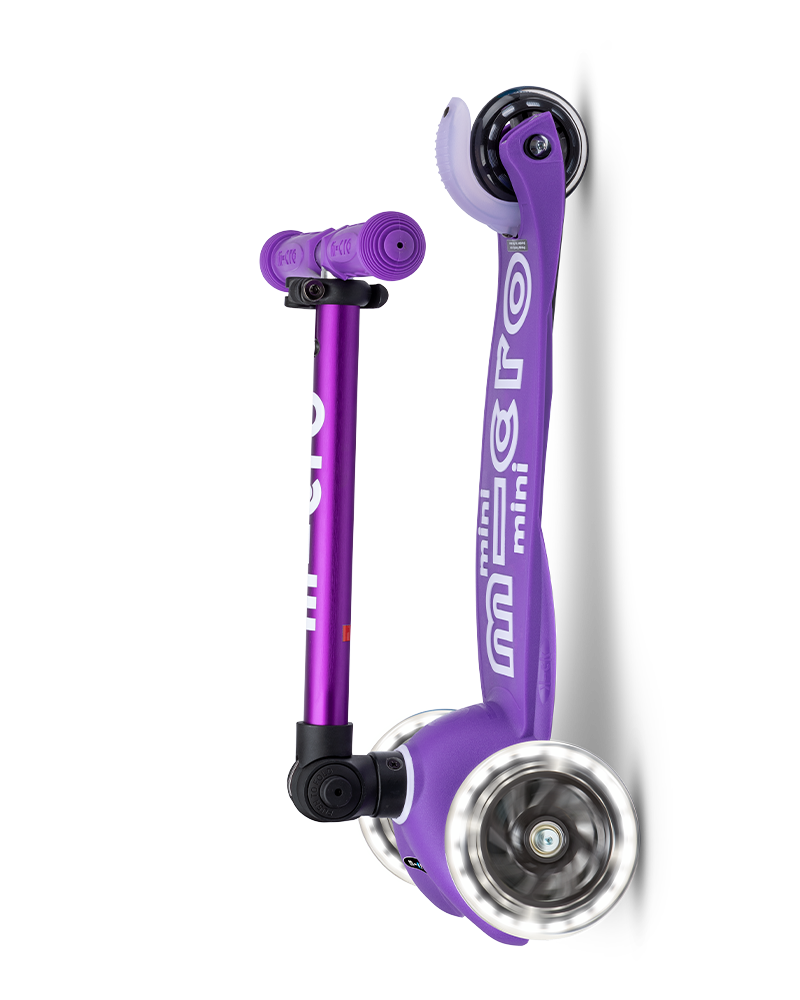 Purple scooter with black accents on a white background