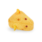 Yellow toy resembling a cheese wedge with holes on a white background