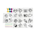 Set of stamps with various designs and colored rubber bands on a white background