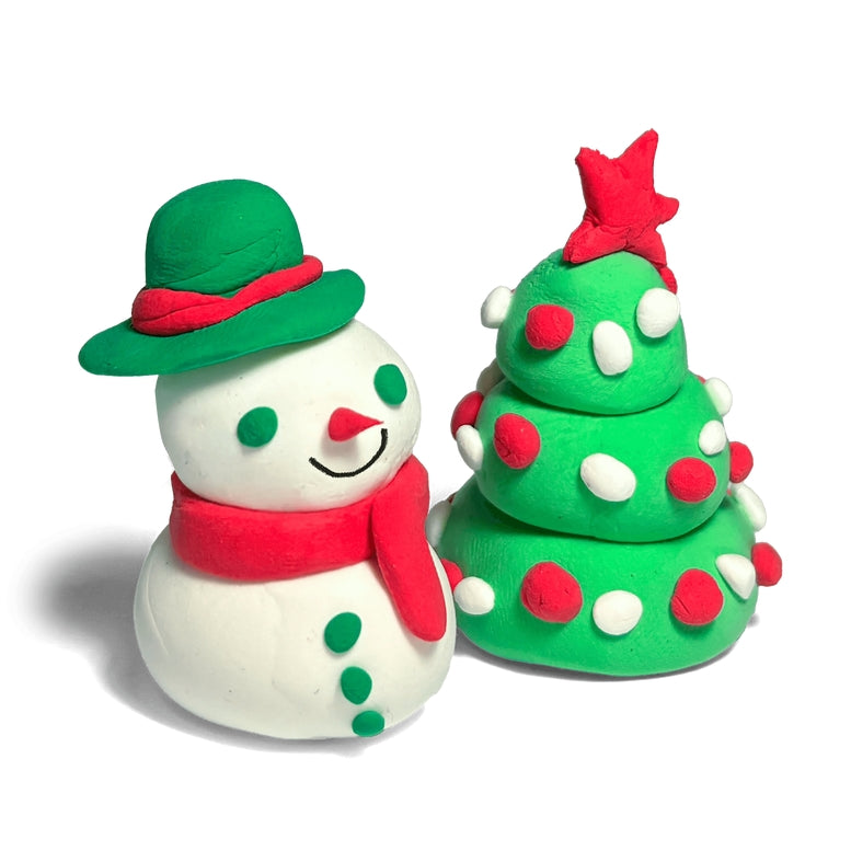 A Christmas-themed clay set featuring a white snowman wearing a green hat and red scarf next to a green Christmas tree with red and white pom-poms and a red star on top, set against a plain white background.